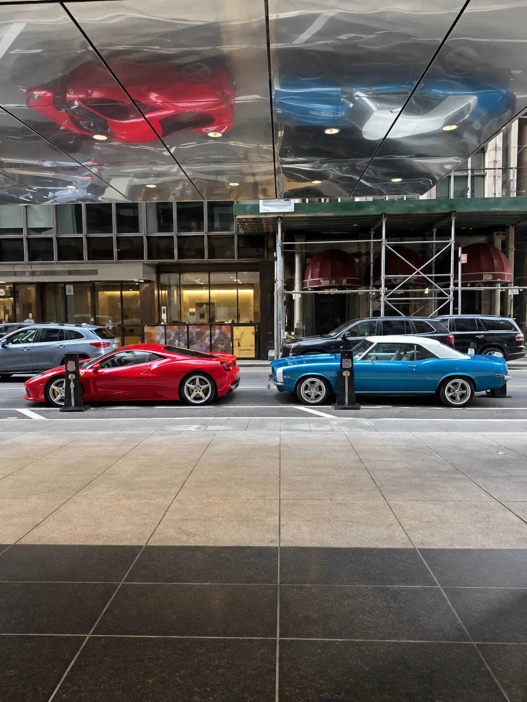 Classic and performance cars outside a private Manhattan club